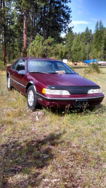 1990 Burgundy Ford Thunderbird