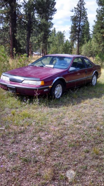 1990 Burgundy Ford Thunderbird