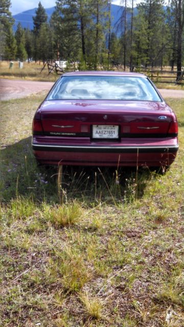 1990 Burgundy Ford Thunderbird