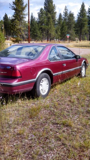 1990 Burgundy Ford Thunderbird