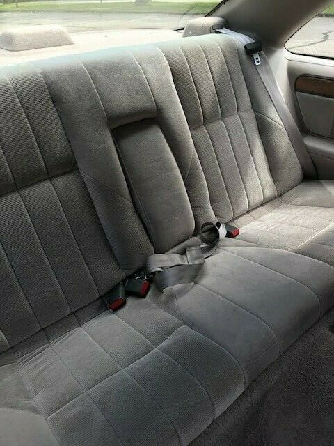 1990 Red Ford Thunderbird Coupe