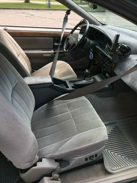 1990 Red Ford Thunderbird Coupe