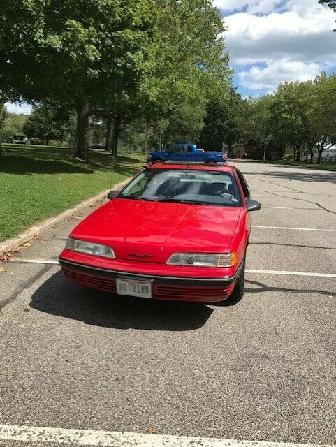 1990 Red Ford Thunderbird Coupe