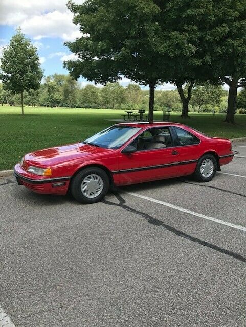 1990 Red Ford Thunderbird Coupe