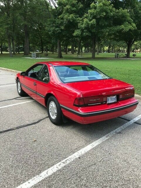 1990 Red Ford Thunderbird Coupe
