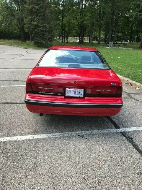 1990 Red Ford Thunderbird Coupe