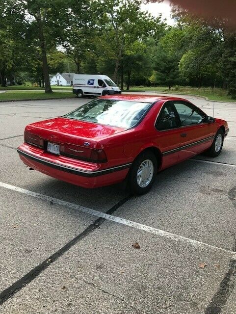 1990 Red Ford Thunderbird Coupe