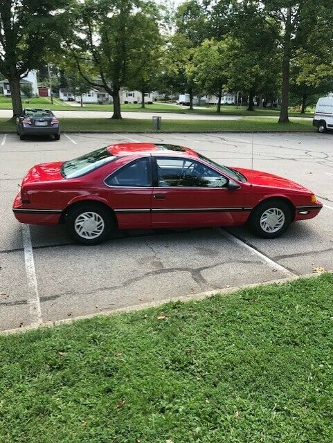 1990 Red Ford Thunderbird Coupe