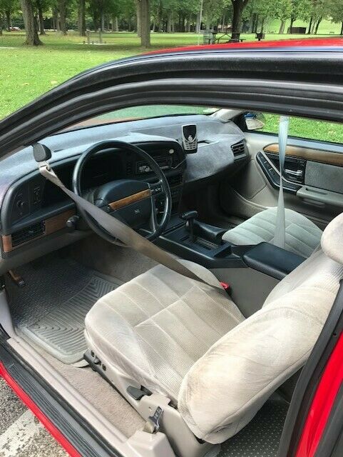1990 Red Ford Thunderbird Coupe