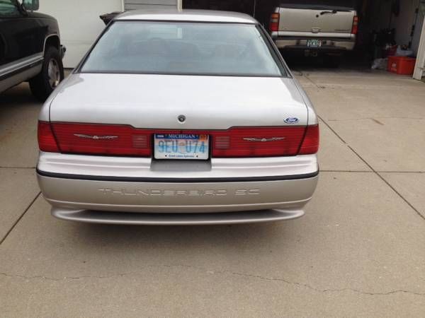 1990 Tan Ford Thunderbird Coupe