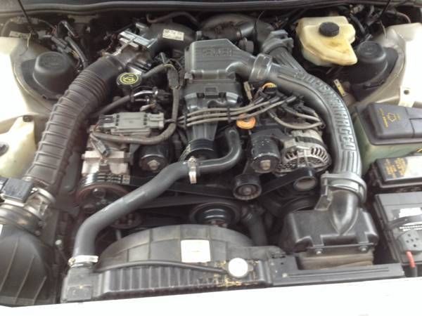 1990 Tan Ford Thunderbird Coupe