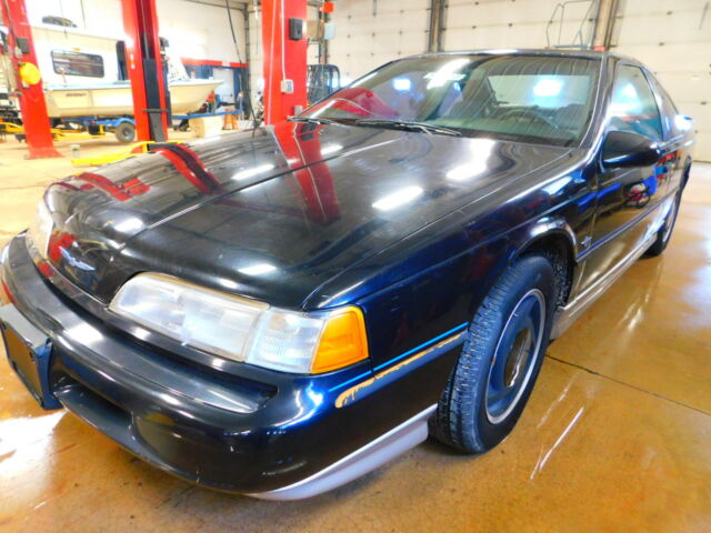 1990 Black Ford Thunderbird Coupe