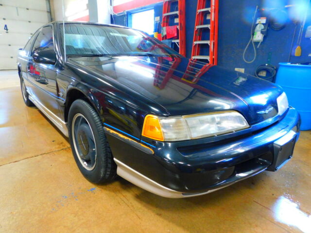 1990 Black Ford Thunderbird Coupe
