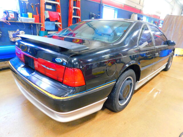1990 Black Ford Thunderbird Coupe