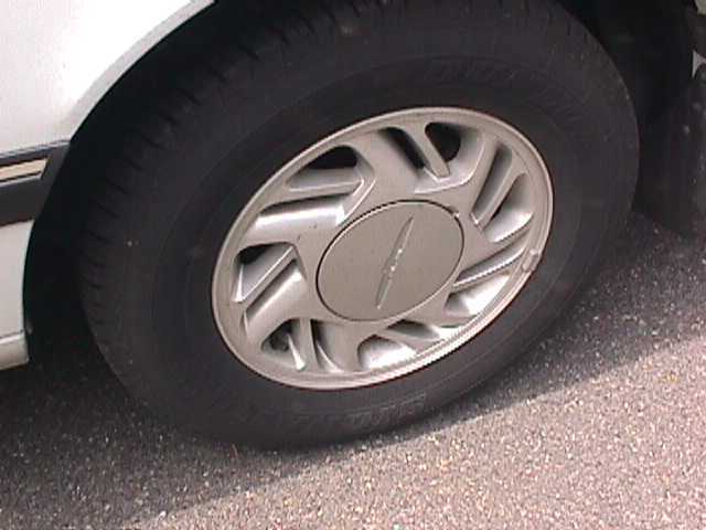 1990 White Ford Thunderbird Coupe