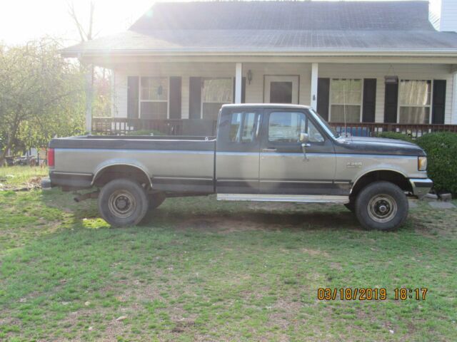 1990 Blue Ford F-250 Extended Cab Pickup