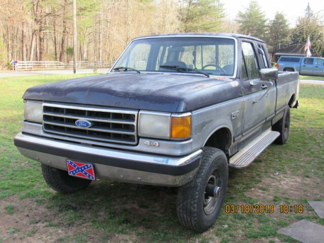 1990 Blue Ford F-250 Extended Cab Pickup