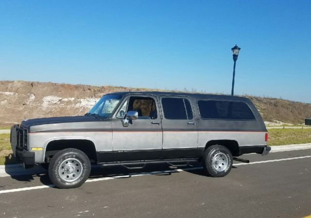 1990 Two Tone Black & Grey GMC Suburban SUV