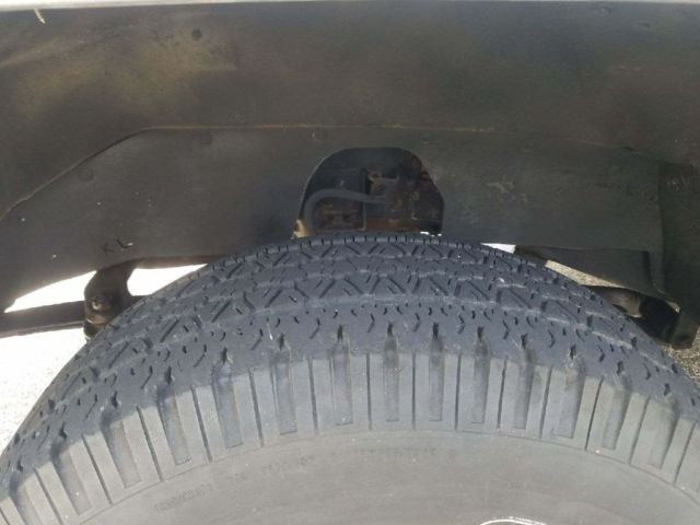 1990 Two Tone Black & Grey GMC Suburban SUV