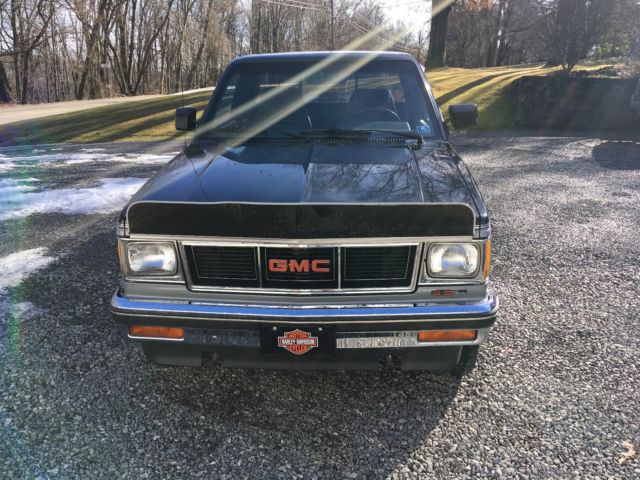 1990 black/silver Chevrolet S-10 Extended Cab Pickup