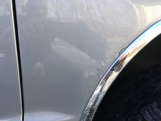 1990 black/silver Chevrolet S-10 Extended Cab Pickup