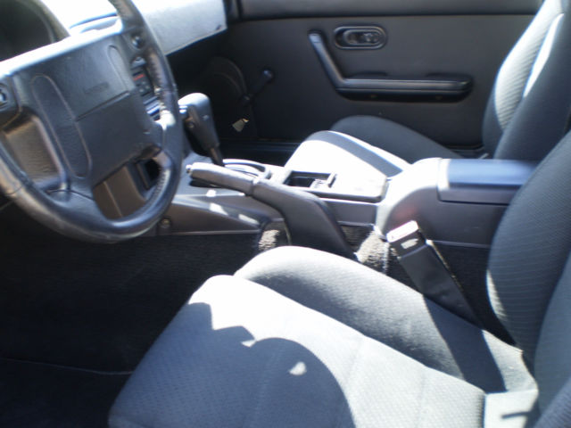 1990 Silver Stone Metallic Mazda MX-5 Miata Convertible