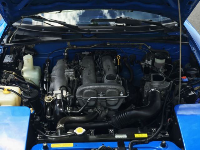 1990 Blue Mazda MX-5 Miata --