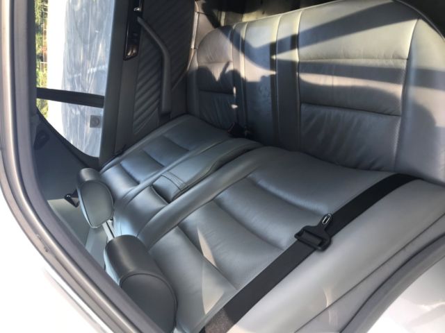 1990 Silver Mercedes-Benz 400-Series Sedan