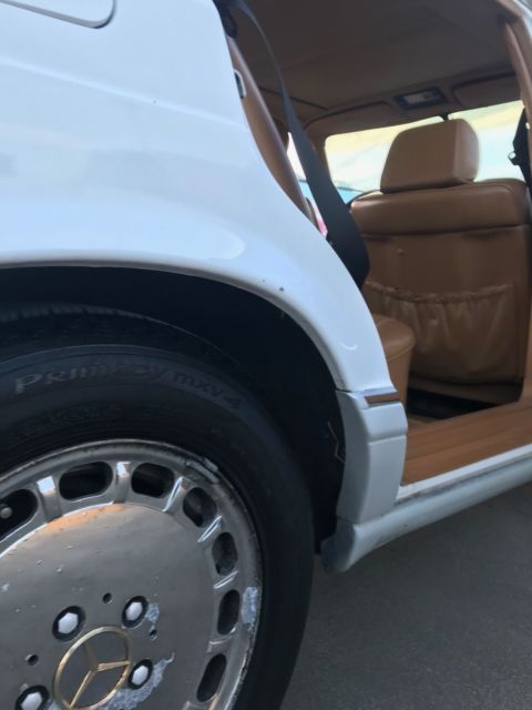 1990 White Mercedes-Benz 500-Series Sedan