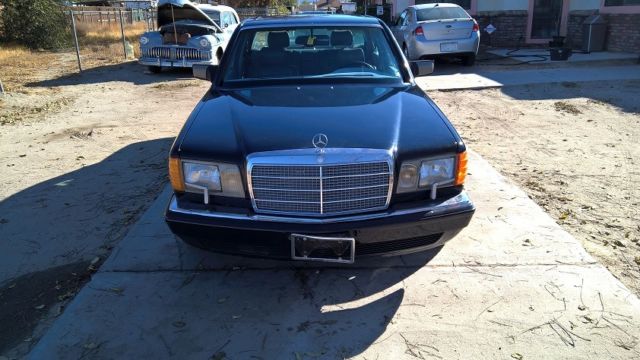 1990 Blue Mercedes-Benz 500-Series Sedan