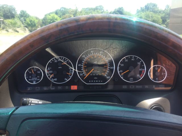 1990 Red Mercedes-Benz 300-Series Convertible