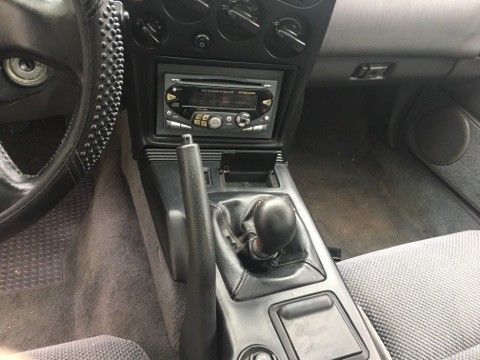 1990 Red Mitsubishi Eclipse Hatchback