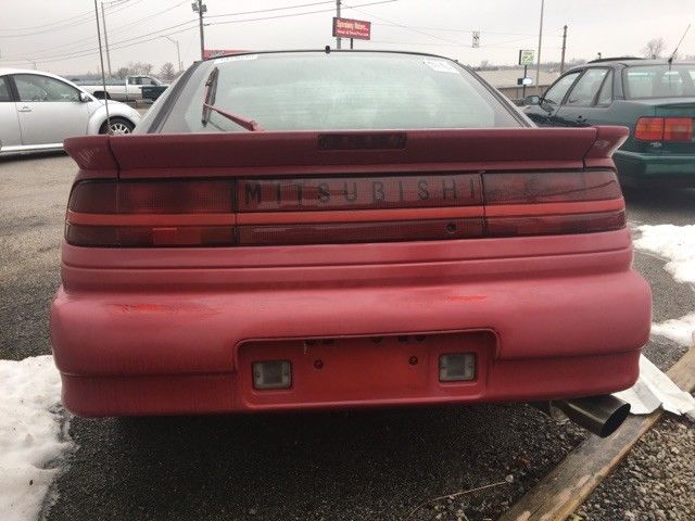 1990 Red Mitsubishi Eclipse Hatchback
