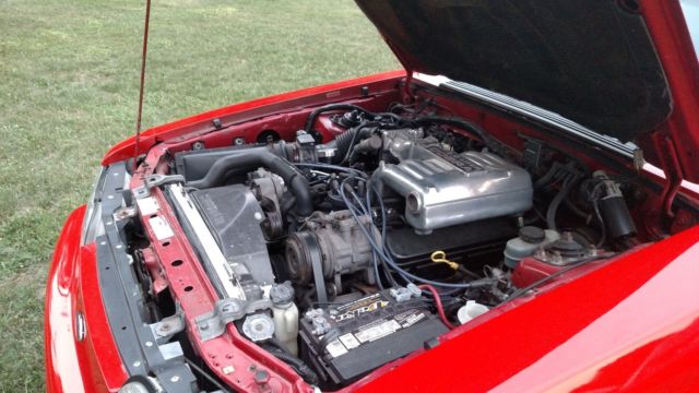 1990 Red Ford Mustang Convertible