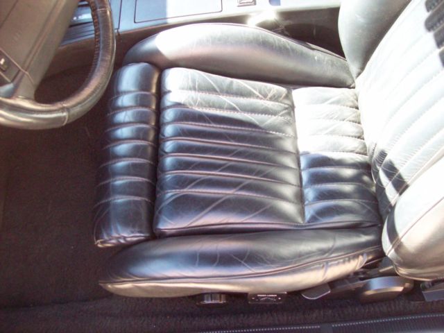 1990 Black Ford Mustang convertible