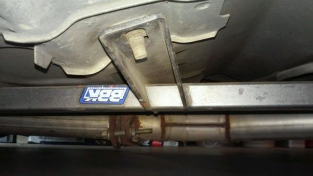 1990 gray Ford Mustang Hatchback