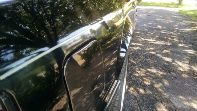 1990 Black Ford Mustang Convertible