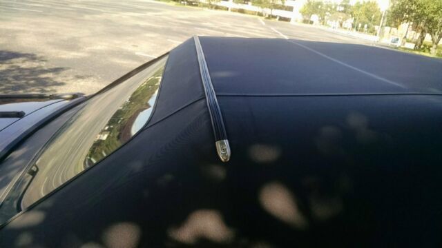 1990 Black Ford Mustang Convertible