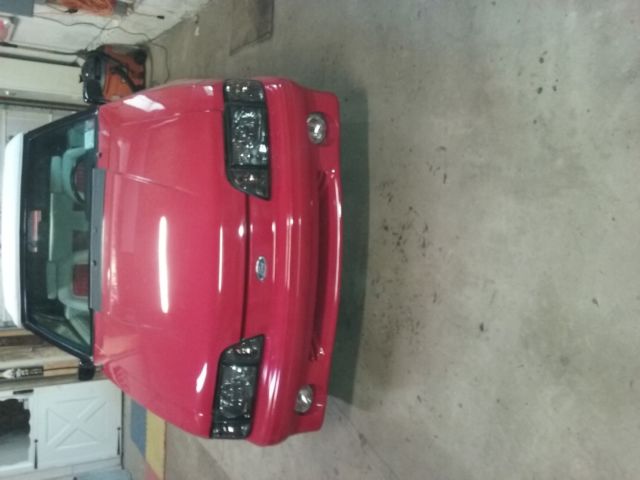 1990 Red Ford Mustang Convertible