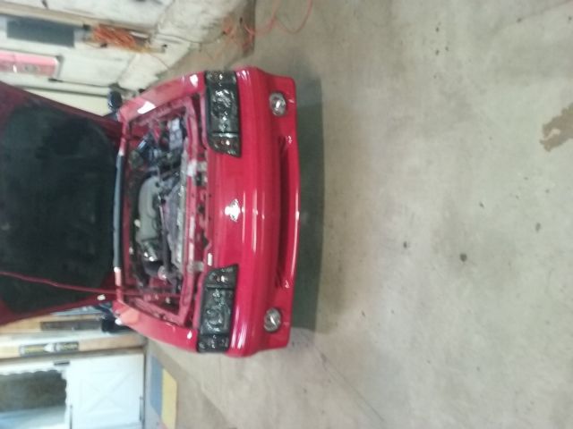 1990 Red Ford Mustang Convertible