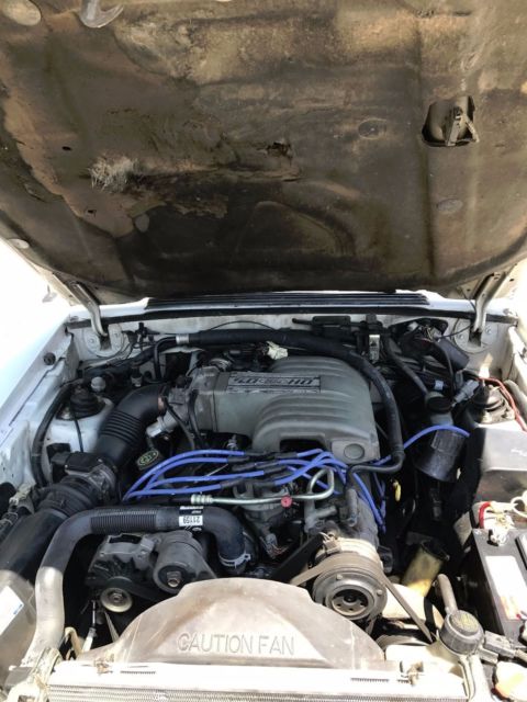 1990 White Ford Mustang Convertible