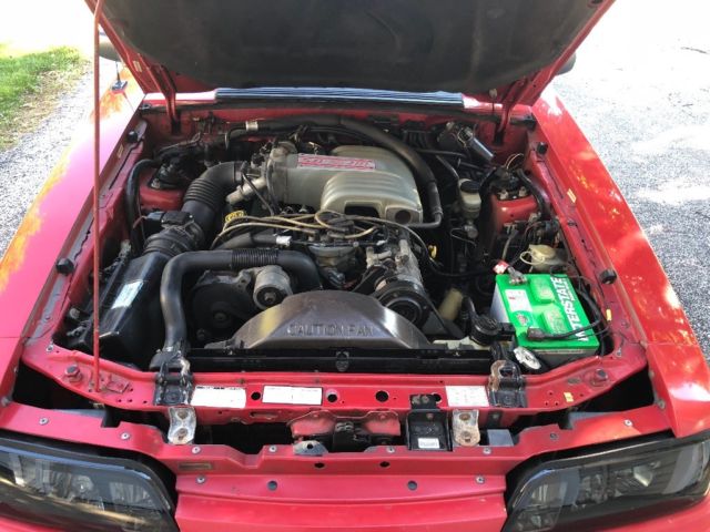 1990 Red Ford Mustang Convertible