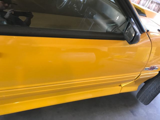 1990 Yellow Ford Mustang Hatchback
