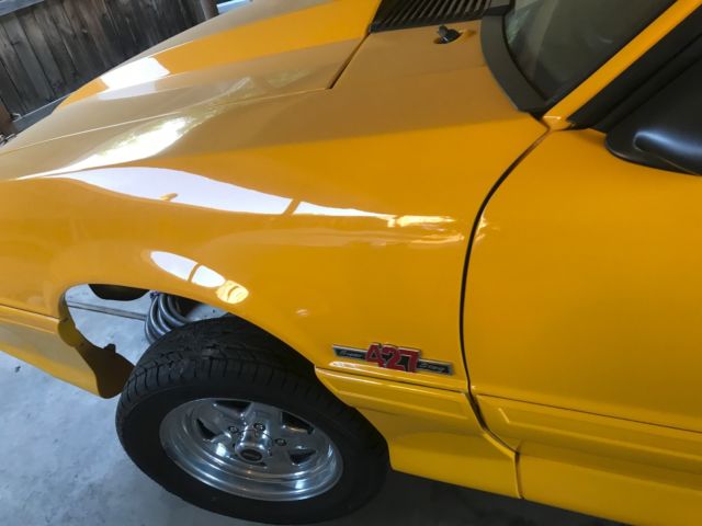 1990 Yellow Ford Mustang Hatchback
