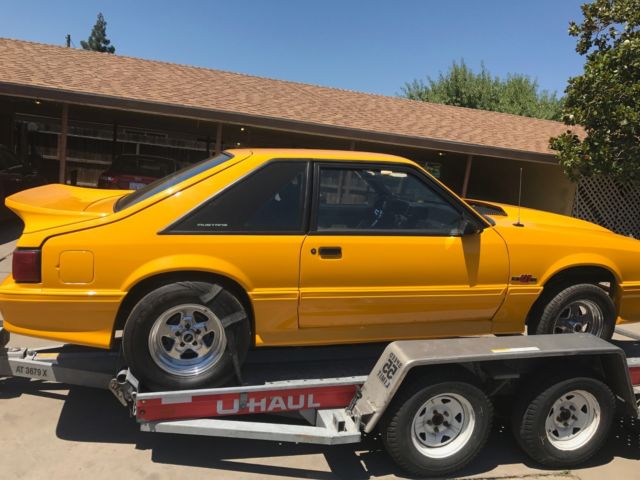 1990 Yellow Ford Mustang Hatchback