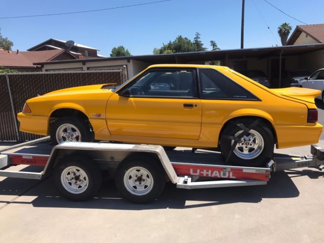 1990 Yellow Ford Mustang Hatchback