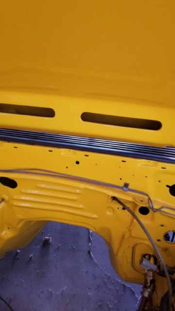 1990 Yellow Ford Mustang Hatchback