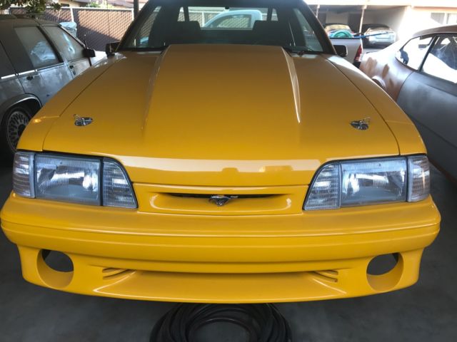 1990 Yellow Ford Mustang Hatchback