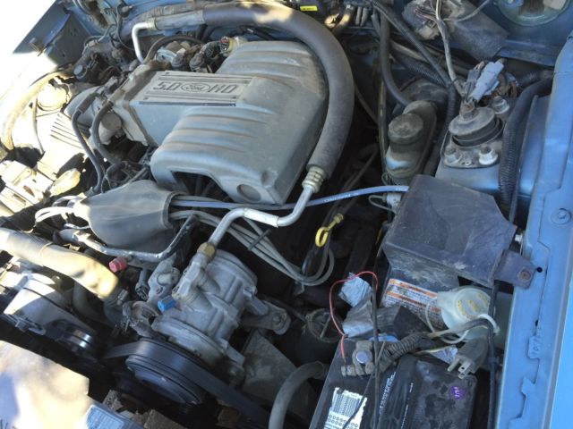 1990 Blue Ford Mustang Convertible