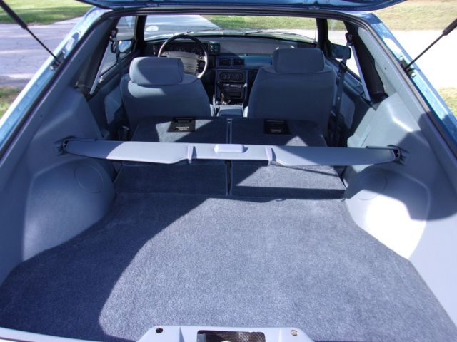 1990 pacific blue Ford Mustang Hatchback